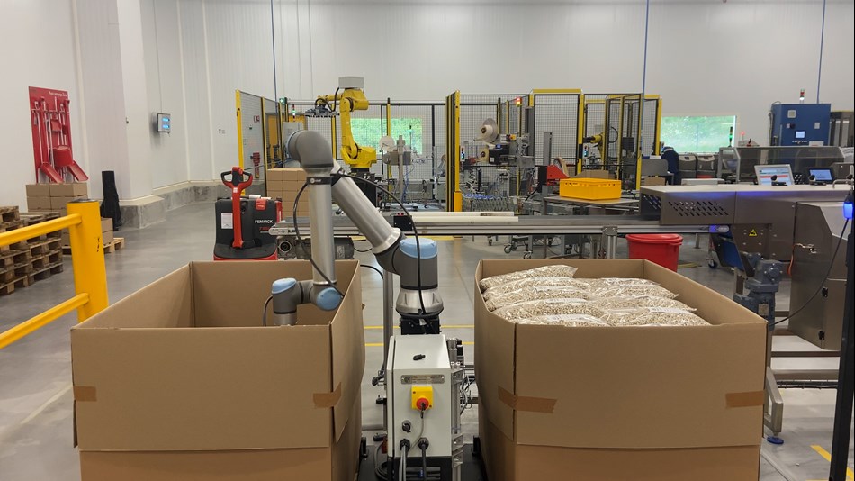 Quand le premier box est rempli, le cobot répète l’opération pour le deuxième